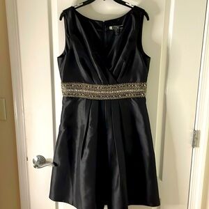 Black party dress with silver sequined pattern